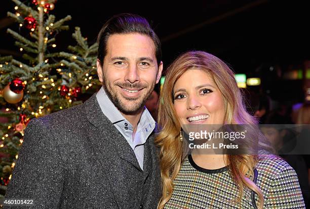 Claudio Pizarro and his wife Karla Salcedo attend the FC Bayern Muenchen Christmas Party at Schubeck's Teatro restaurant on December 7, 2014 in...