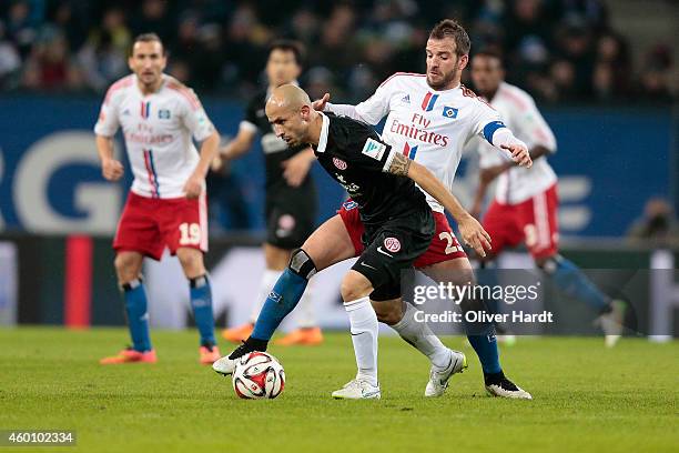 Rafael van der Vaart of Hamburg and Elkin Soto of Mainz compete during the First Bundesliga match between Hamburger SV and 1. FSV Mainz 05 at Imtech...