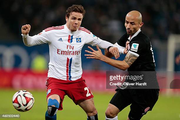 Nicolai Mueller of Hamburg and Elkin Soto of Mainz compete during the First Bundesliga match between Hamburger SV and 1. FSV Mainz 05 at Imtech Arena...