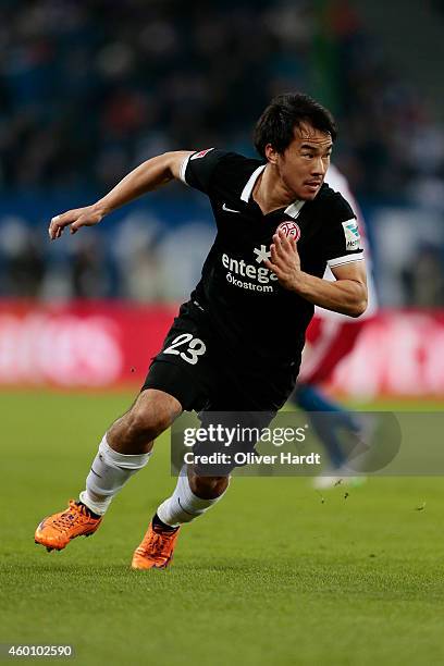 Shinji Okazaki of Mainz in action during the First Bundesliga match between Hamburger SV and 1. FSV Mainz 05 at Imtech Arena on December 7, 2014 in...