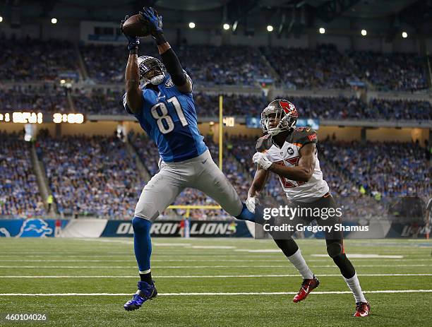 Calvin Johnson of the Detroit Lions catches a first quarter touchdown in front of Johnthan Banks of the Tampa Bay Buccaneers at Ford Field on...