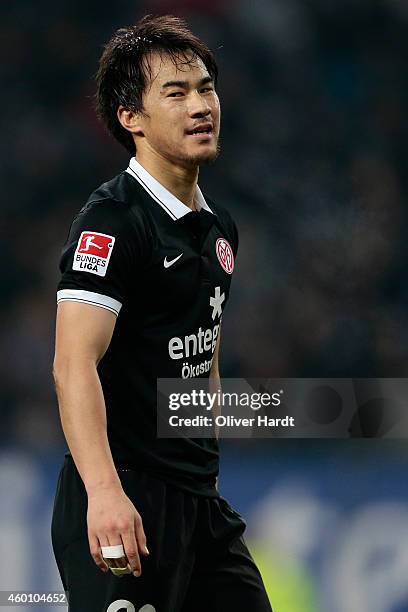 Shinji Okazaki of Mainz in action during the First Bundesliga match between Hamburger SV and 1. FSV Mainz 05 at Imtech Arena on December 7, 2014 in...