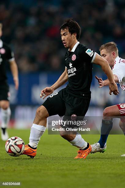 Shinji Okazaki of Mainz in action during the First Bundesliga match between Hamburger SV and 1. FSV Mainz 05 at Imtech Arena on December 7, 2014 in...