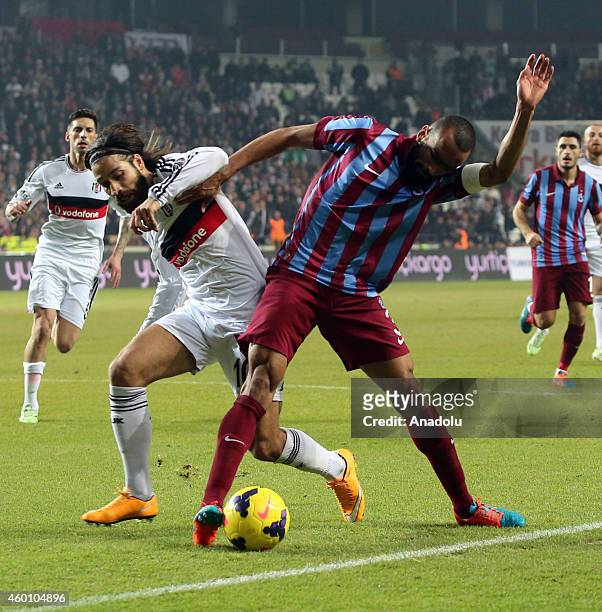 Besiktas' Olcay Sahan vies for the ball with Jose Bosingwa da Silva of Trabzonspor during the Turkish Super Toto Super League soccer match between...
