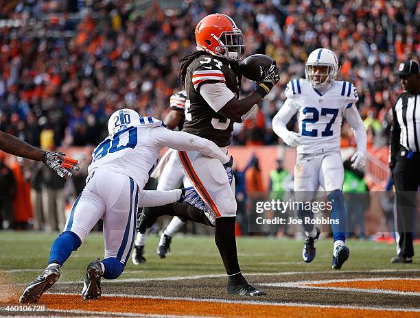 Isaiah Crowell of the Cleveland Browns scores a touchdown in front of Darius Butler of the Indianapolis Colts during the second quarter at...