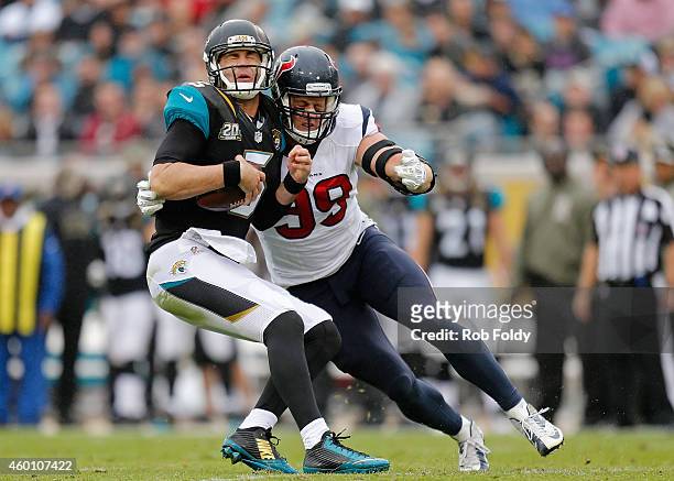 Watt of the Houston Texans sacks Blake Bortles of the Jacksonville Jaguars during the first half of the game at EverBank Field on December 7, 2014 in...