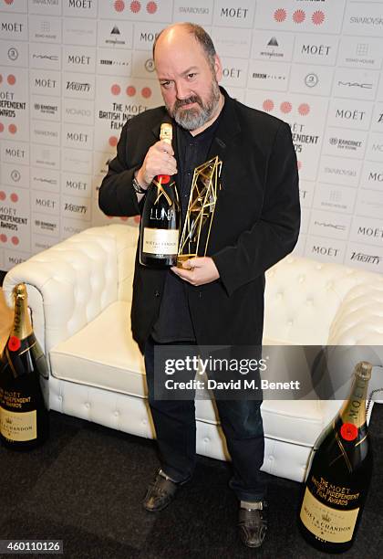 Dave McKean, winner of The Raindance Award for Luna, poses at The Moet British Independent Film Awards 2014 at Old Billingsgate Market on December 7,...