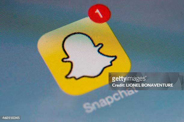 The logo of mobile app "Snapchat" is displayed on a tablet on January 2, 2014 in Paris. Hackers broke into Snapchat, the hugely popular mobile app,...