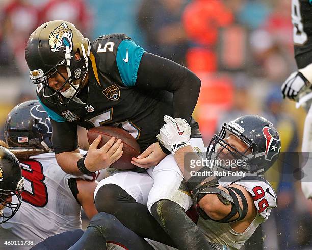 Watt of the Houston Texans sacks Blake Bortles of the Jacksonville Jaguars during the second half of the game at EverBank Field on December 7, 2014...