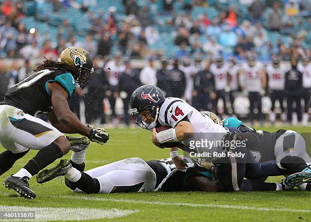 Ryan Fitzpatrick of the Houston Texans is stopped short of the goal line during the second half of the game against the Jacksonville Jaguars at...