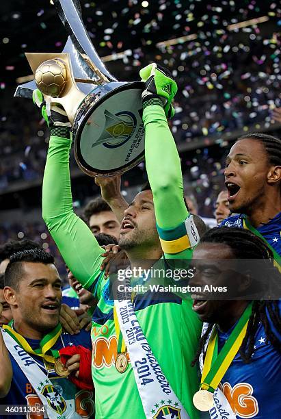 Players of Cruzeiro celebrate after winning the the cup of champions against Fluminense during the Brasileirao Series A 2014 at Mineirao Stadium on...