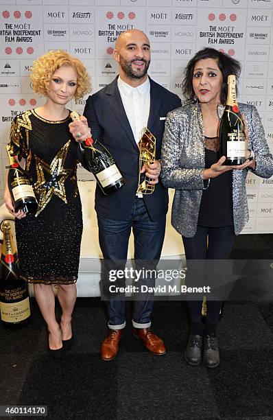 MyAnna Buring, Yann Demange, winner of the Best Director award for "'71", and Meera Syal pose at The Moet British Independent Film Awards 2014 at Old...