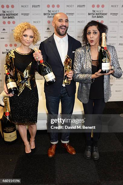 MyAnna Buring, Yann Demange, winner of the Best Director award for "'71", and Meera Syal pose at The Moet British Independent Film Awards 2014 at Old...