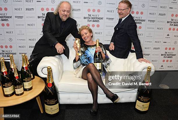 Bill Bailey, Emma Thompson, winner of the Richard Harris Award, and Jared Harris pose at The Moet British Independent Film Awards 2014 at Old...
