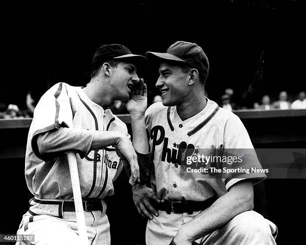 Stan Musial of the St. Louis Cardinals and Del Ennis of the Philadelphia Philles talk on the field circa 1950.