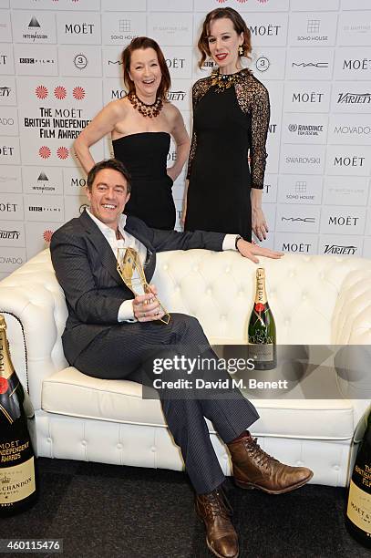 Jon Ronson, winner of the Best Screenplay award for "Frank", Lesley Manville and Chloe Pirrie pose at The Moet British Independent Film Awards 2014...