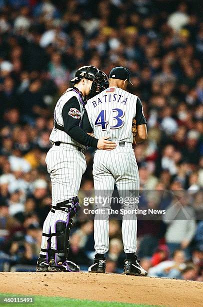 Miguel Batista and Rod Barajas of the Arizona Diamondbacks during Game Five of the World Series against the New York Yankees on November 1, 2001 at...