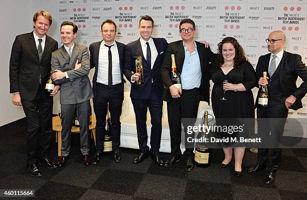 Presenter Tom Hooper, Andrew Scott, director Matthew Warchus, guest, Stephen Beresford, presenter Stanley Tucci and David Livingstone, winners of the...