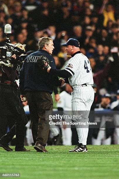 United States president George H.W. Bush shakes hands with New York Yankees catcher Todd Greene prior to throwing out the first pitch before Game...