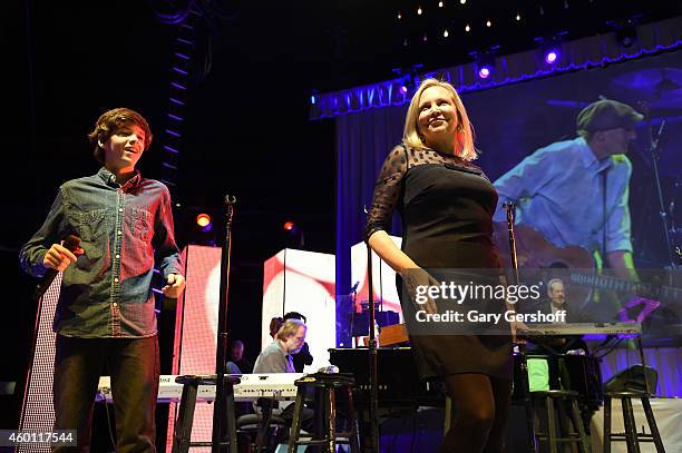 Henry Taylor and Kim Taylor perform onstage at Madison Square Garden on December 5, 2014 in New York City.