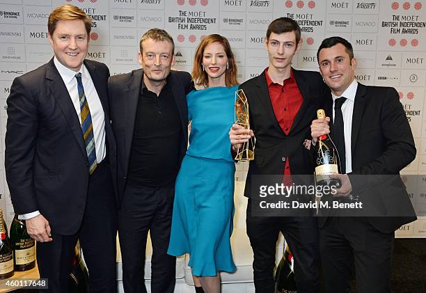 Mike Elliott, Guy Myhill, Sienna Guillory, Liam Walpole and Lee Groombridge, winners of the Best Achievement in Production award for "The Goob", pose...