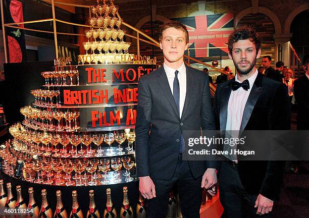 George MacKay and Chris Overton attend the Moet British Independent Film Awards 2014 at Old Billingsgate Market on December 7, 2014 in London,...