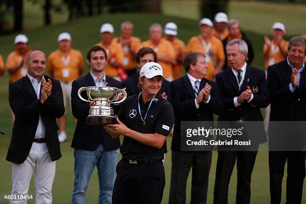 Emiliano Grillo of Argentina celebrates with the trophy after the closing day of the 109th VISA Open Argentina as part of PGA Latinoamerica tour at...