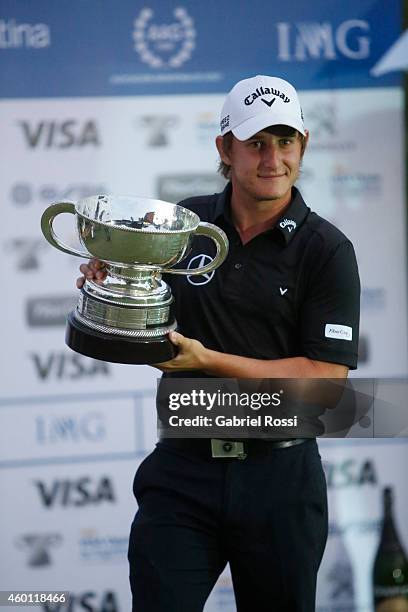 Emiliano Grillo of Argentina celebrates with the trophy after the closing day of the 109th VISA Open Argentina as part of PGA Latinoamerica tour at...