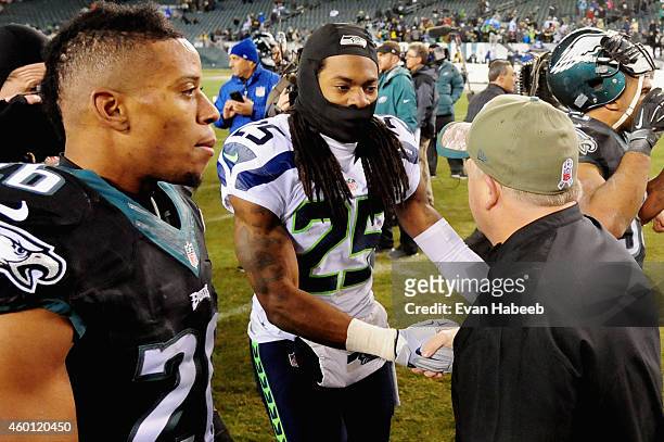 Richard Sherman of the Seattle Seahawks shakes hands with head coach Chip Kelly of the Philadelphia Eagles after the Seahawks 24-14 win at Lincoln...