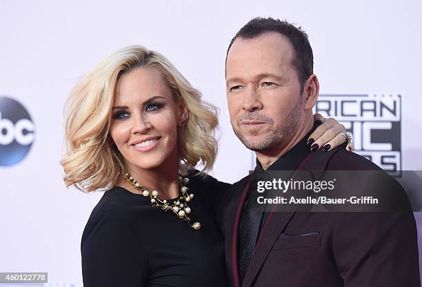 Actress Jenny McCarthy and actor/singer Donnie Wahlberg arrive at the 2014 American Music Awards at Nokia Theatre L.A. Live on November 23, 2014 in...