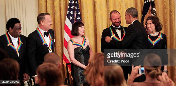 Honorees Singer Al Green, actor/producer Tom Hanks, ballerina Patricia McBride, musician Sting and actress/comedienne Lily Tomlin with President...