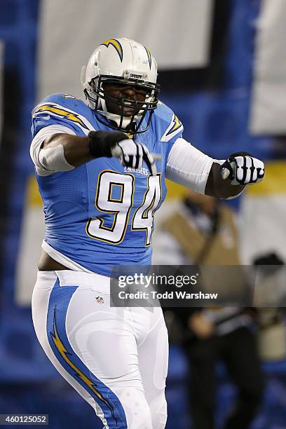 Defensive end Corey Liuget of the San Diego Chargers celebrates after a quarterback sack against the New England Patriots at Qualcomm Stadium on...