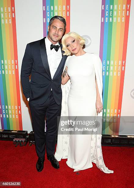 Taylor Kinney and Lady Gaga arrive at the 37th Annual Kennedy Center Honors at the John F. Kennedy Center for the Performing Arts on December 7, 2014...