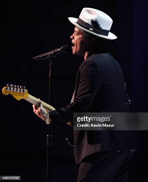 Bruno Mars performs onstage at the 37th Annual Kennedy Center Honors at The John F. Kennedy Center for Performing Arts on December 7, 2014 in...
