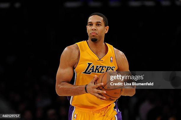 Xavier Henry of the Los Angeles Lakers drives the ball upcourt against the Minnesota Timberwolves at Staples Center on December 20, 2013 in Los...