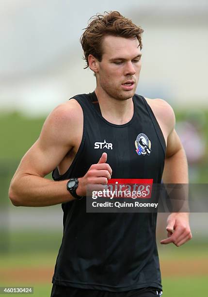 Matt Scharenberg of the Magpies jogs during a Collingwood AFL pre-season training session at Westpac Centre on December 8, 2014 in Melbourne,...