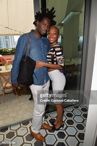 Bradley Theodore and Tanya Sergei attend The John Varvatos Art Basel Closing Brunch In Support Of Bass Museum Of Art at Soho Beach House on December...