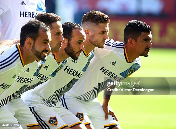 Juninho, Marcelo Sarvas, Landon Donovan, Robbie Rogers and A.J. DeLaGarza of the Los Angeles Galaxy pose for a photo prior to their 2014 MLS Cup...