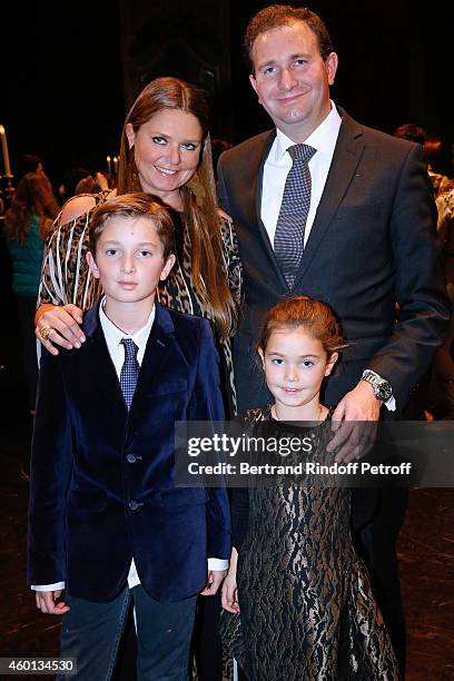 President of committee "Reve d'enfants 2014" Karin Rudnicki-Schlumberger and her family attend the Matinee "Reve d'enfants" with Opera "Casse...