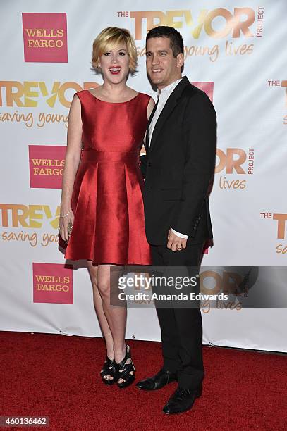 Actress Molly Ringwald and her husband Panio Gianopoulos arrive at the TrevorLIVE Los Angeles benefit event at the Hollywood Palladium on December 7,...