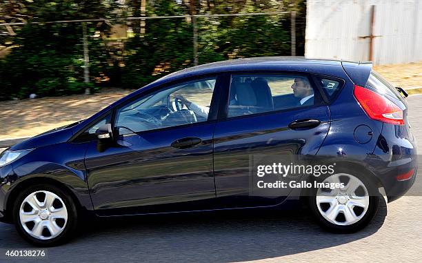 Shrien Dewani leaves Valkenberg Hospital on December 8, 2014 in Cape Town, South Africa. Shrien Dewani is accused of organising his wife's murder...