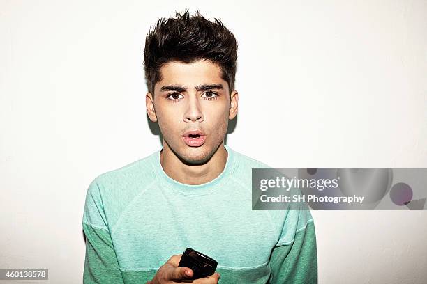 Singer Zayn Malik of pop band One Direction is photographed on May 9, 2012 in London, England.