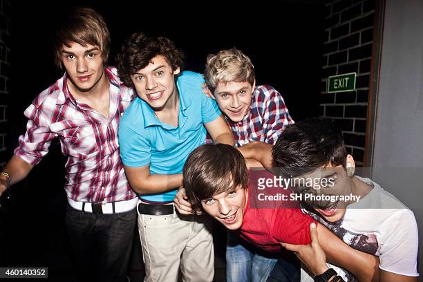 Pop band One Direction are photographed on September 13, 2010 in London, England.