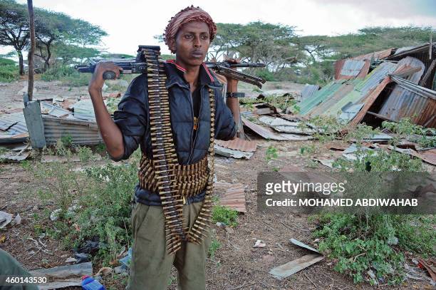 Member of the Somali security forces stands guard during an operation against Al-Shebab in Mogadishu on December 8, 2014. Al-Qaeda-affiliated Shebab...
