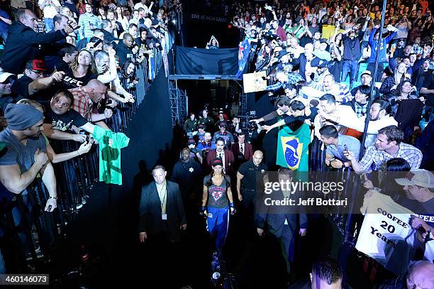 Miesha Tate enters the arena prior to her bout against UFC Women's Bantamweight Champion Ronda Rousey during the UFC 168 event at the MGM Grand...