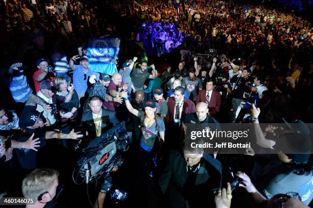 Miesha Tate enters the arena prior to her bout against UFC Women's Bantamweight Champion Ronda Rousey during the UFC 168 event at the MGM Grand...