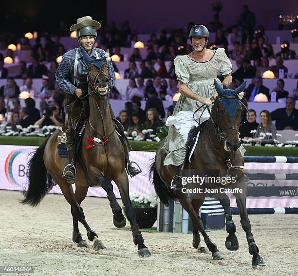 Nicolas Canteloup of France disguised as Charles Ingalls and his 'wife' Vincent Bartin disguised as Caroline Lake Ingalls participate at the Pro-Am...