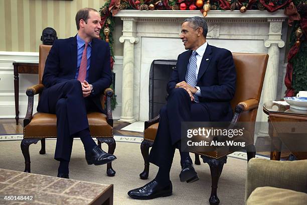 President Barack Obama meets with Prince William , Duke of Cambridge, in the Oval Office of the White House December 8, 2014 in Washington, DC....