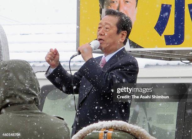 People's Life Party leader Ichiro Ozawa makes a street speech in the snow to call for support on December 6, 2014 in Hanamaki, Iwate, Japan. The...