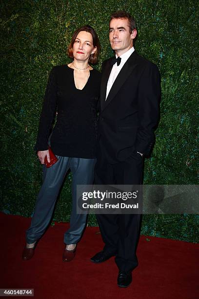 Rufus Norris and guest attends the 60th London Evening Standard Theatre Awards at London Palladium on November 30, 2014 in London, England.